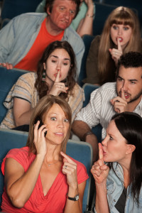 Loud woman on phone annoys people in theater